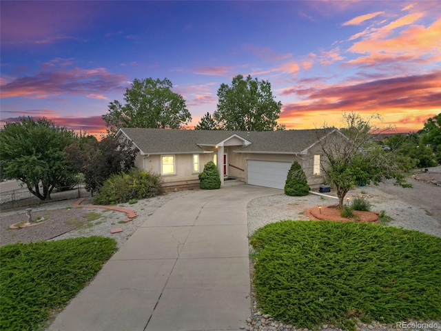 single story home with a garage