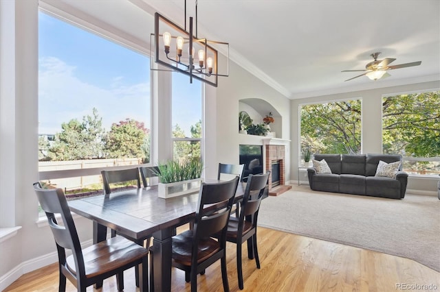 interior space featuring ceiling fan with notable chandelier