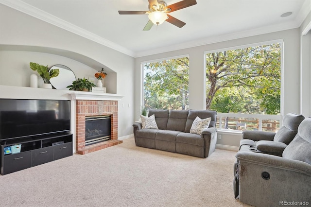 carpeted living room featuring ornamental molding and a healthy amount of sunlight