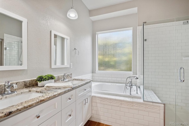 bathroom with vanity, shower with separate bathtub, and wood-type flooring