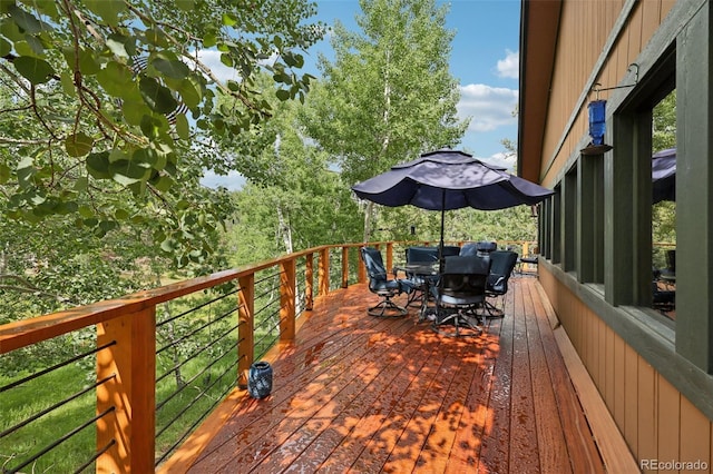 20033 Silver Ranch Rd, Conifer, CO 80433 - wooden deck featuring outdoor dining space