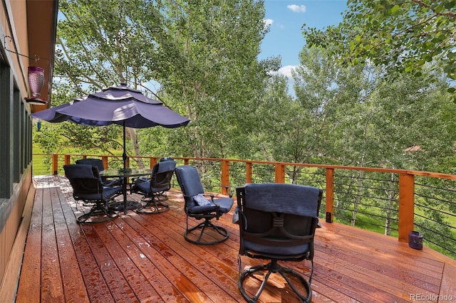 20033 Silver Ranch Rd, Conifer, CO 80433 - wooden deck featuring outdoor dining space