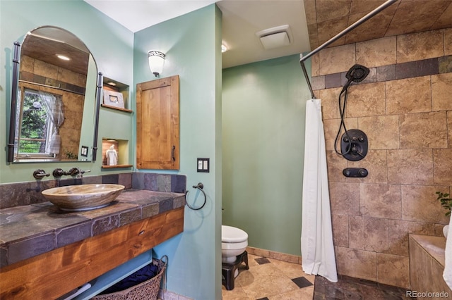 20033 Silver Ranch Rd, Conifer, CO 80433 - full bathroom featuring tiled shower, vanity, and tile patterned floors