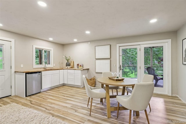 20033 Silver Ranch Rd, Conifer, CO 80433 - dining room with recessed lighting, healthy amount of natural light, and light wood-style floors