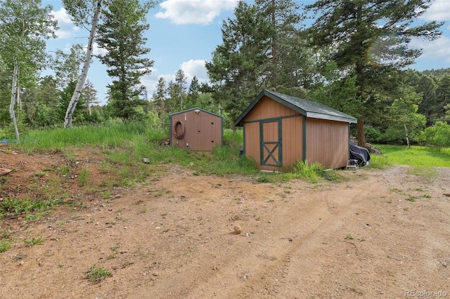 20033 Silver Ranch Rd, Conifer, CO 80433 - view of yard with a storage unit