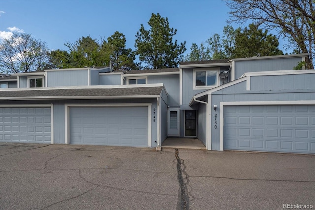 view of property featuring a garage