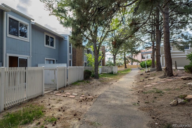 view of asphalt alley