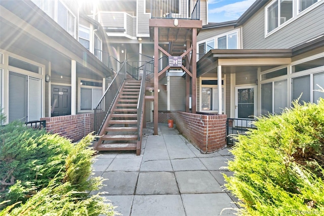 entrance to property with a patio area