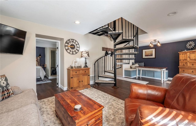315 Maestes St, Johnstown, CO 80534 - living area featuring recessed lighting, baseboards, stairs, and wood finished floors