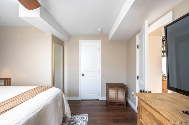 315 Maestes St, Johnstown, CO 80534 - bedroom with baseboards and dark wood-style flooring