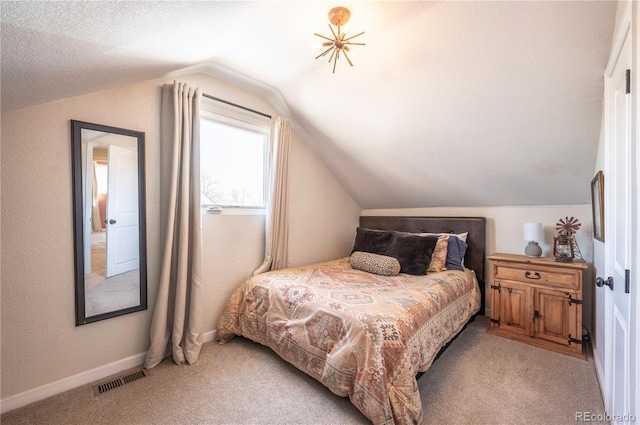 315 Maestes St, Johnstown, CO 80534 - bedroom with baseboards, light colored carpet, lofted ceiling, and visible vents