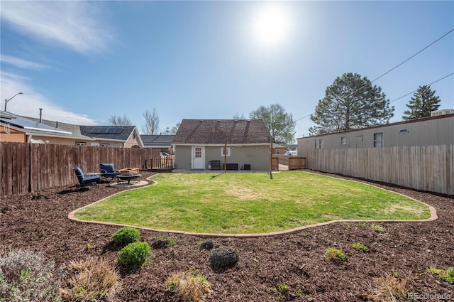 315 Maestes St, Johnstown, CO 80534 - view of yard featuring a fenced backyard and a fire pit