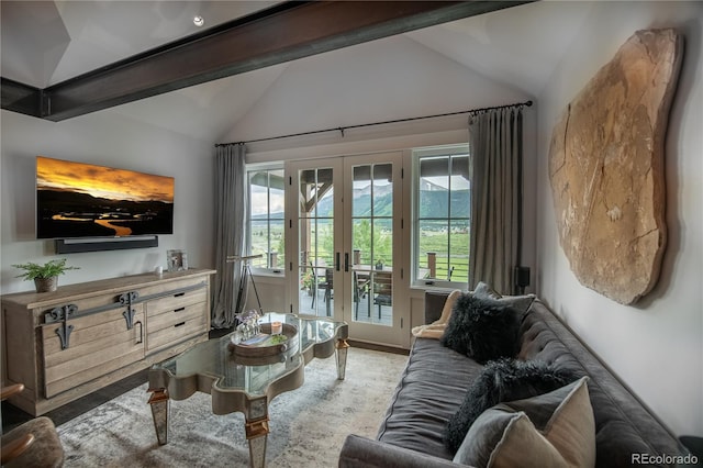 living room with vaulted ceiling with beams and french doors