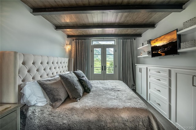 921 County Road 317, Crested Butte, CO 81224 - bedroom with a wooden ceiling with exposed beams and access to exterior