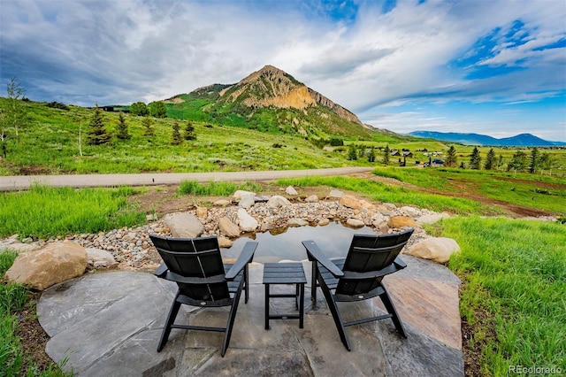 921 County Road 317, Crested Butte, CO 81224 - view of patio with a mountain view