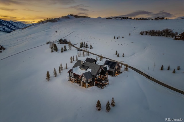 921 County Road 317, Crested Butte, CO 81224 - snowy aerial view featuring a mountain view