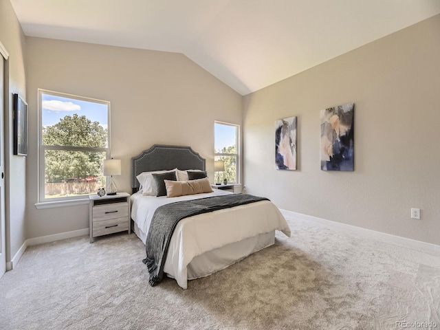 4287 Brookwood Pl, Highlands Ranch, CO 80130 - bedroom with lofted ceiling, multiple windows, and light carpet