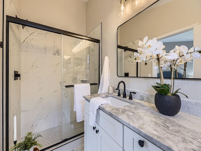 4287 Brookwood Pl, Highlands Ranch, CO 80130 - full bathroom with vanity and a marble finish shower