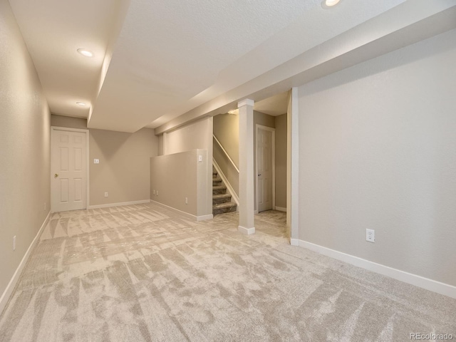 4287 Brookwood Pl, Highlands Ranch, CO 80130 - finished below grade area with light colored carpet, stairway, and recessed lighting