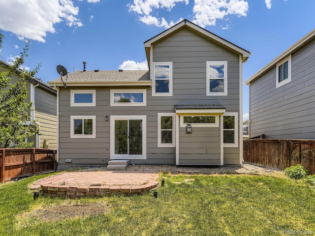 4287 Brookwood Pl, Highlands Ranch, CO 80130 - back of house featuring a fenced backyard and a patio area