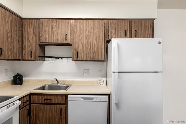 5995 W Hampden Ave Unit 20B, Denver, CO 80227 - kitchen featuring white appliances and light countertops