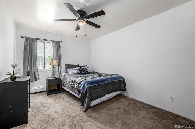 5995 W Hampden Ave Unit 20B, Denver, CO 80227 - bedroom with a baseboard heating unit, carpet, and a ceiling fan