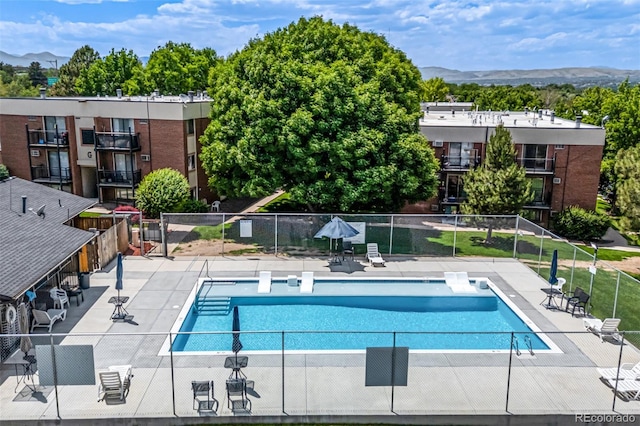 5995 W Hampden Ave Unit 20B, Denver, CO 80227 - community pool featuring a mountain view