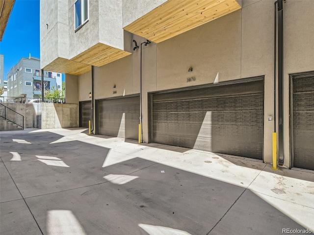 view of home's community with an attached garage