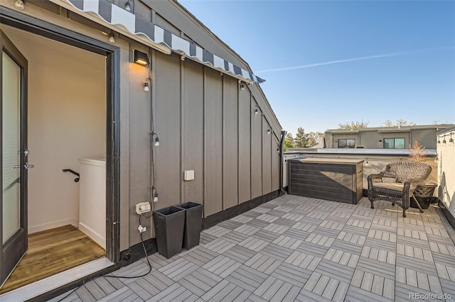 view of patio / terrace with a jacuzzi
