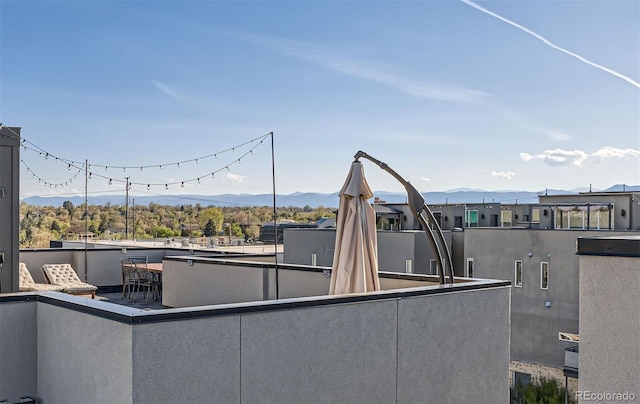 view of patio with a balcony