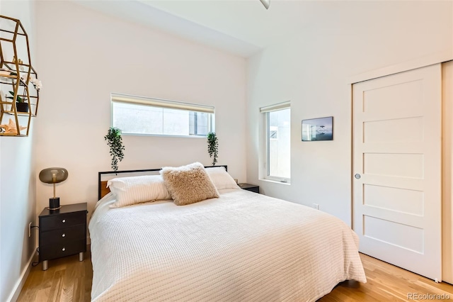bedroom with light wood-style floors