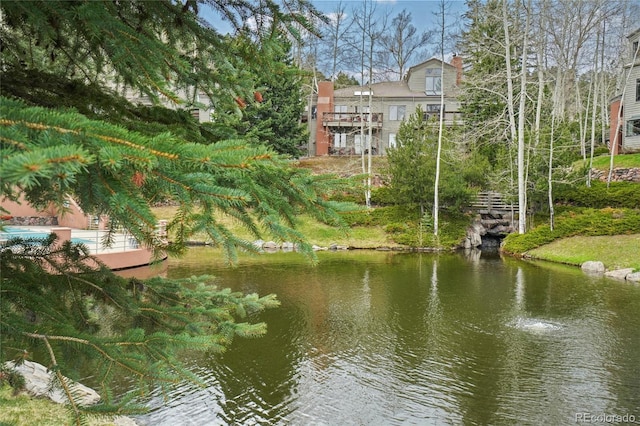 view of home's community featuring a water view