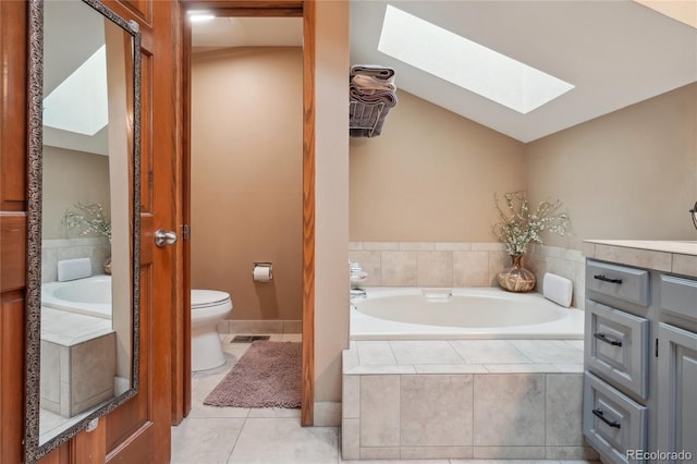 full bath with tile patterned floors, toilet, a bath, and visible vents