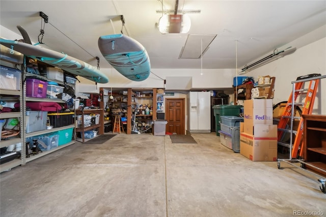 storage area with attic access and a garage