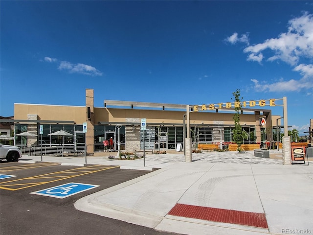 view of property with uncovered parking