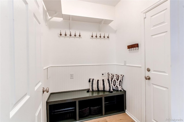 mudroom featuring wainscoting