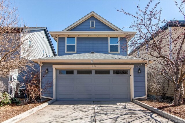 view of front facade featuring a garage and driveway