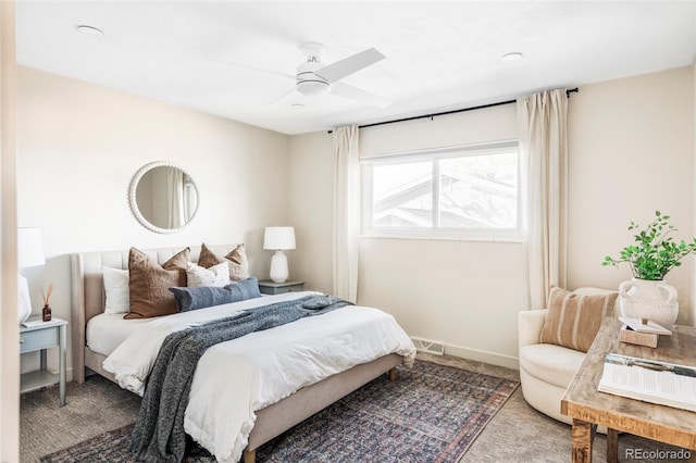 bedroom with carpet floors, baseboards, visible vents, and ceiling fan