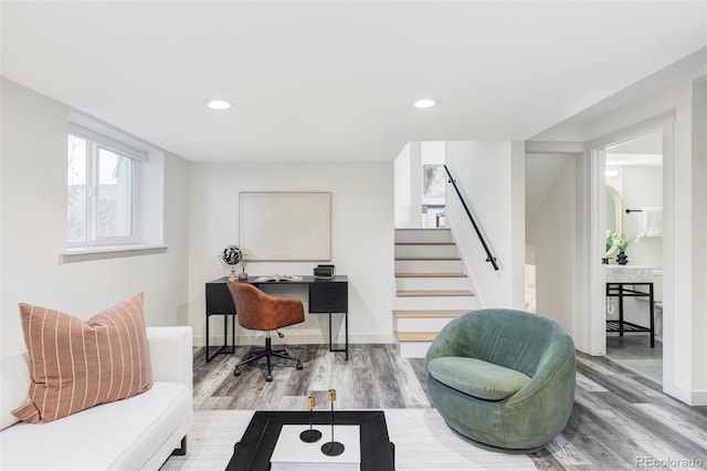 office space with recessed lighting, baseboards, and wood finished floors