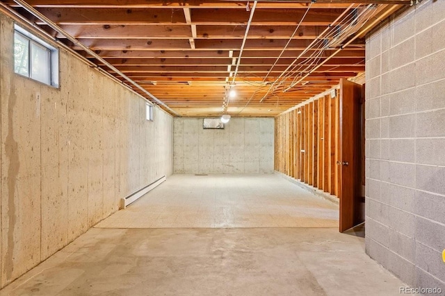 basement featuring baseboard heating