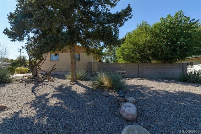 view of yard with fence