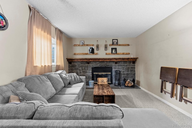 living room with carpet flooring, a textured ceiling, a fireplace, and baseboards