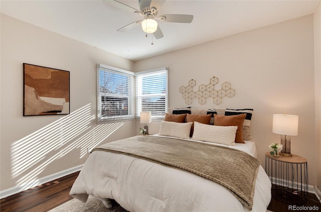 bedroom featuring ceiling fan and wood-type flooring