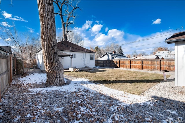 view of yard covered in snow