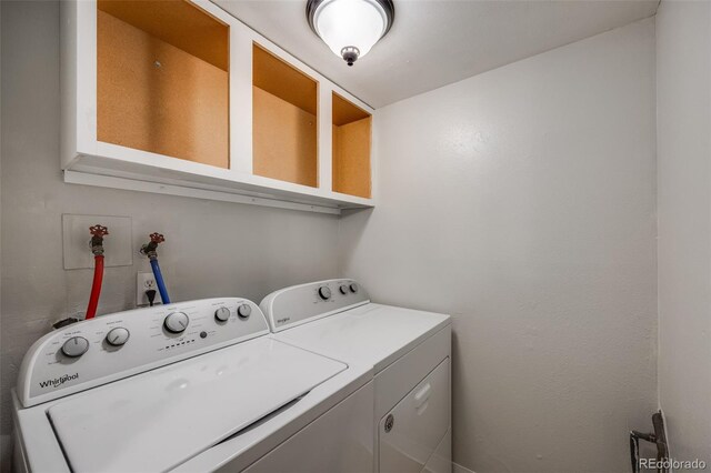 laundry room featuring washer and clothes dryer