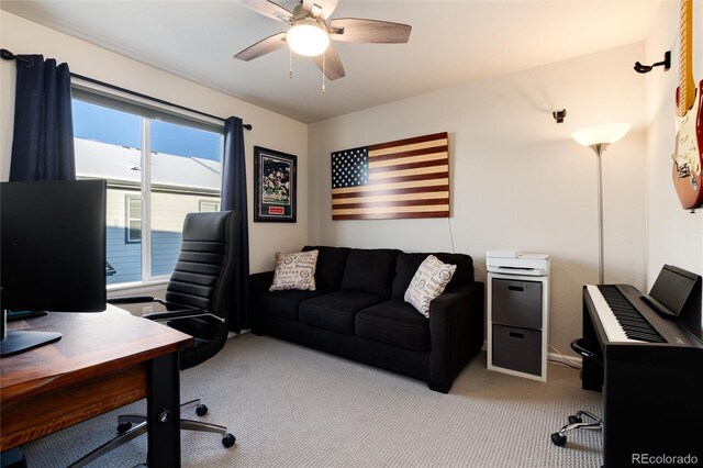 office with carpet and a ceiling fan