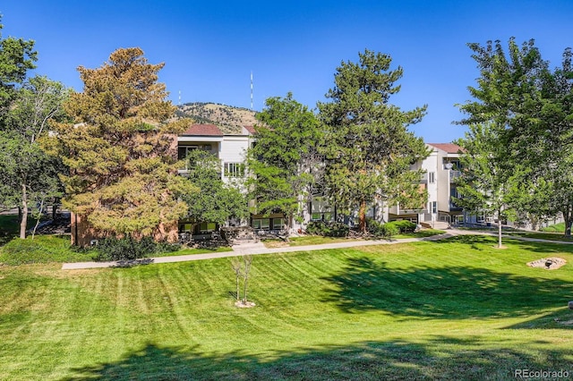 1400 Golden Cir Unit 102, Golden, CO 80401 - view of property's community with a lawn