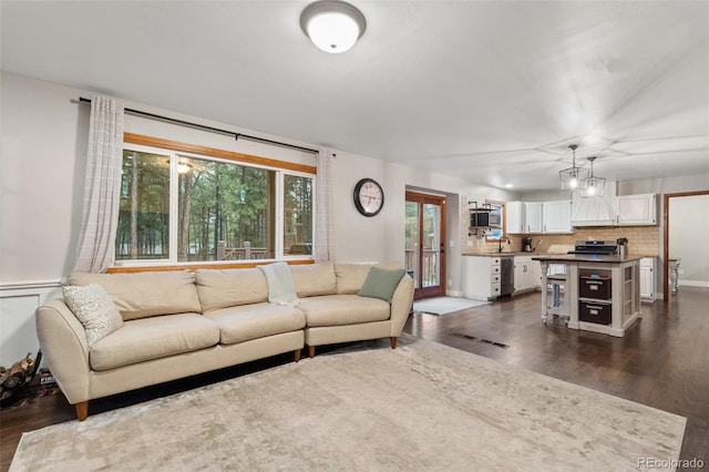 17540 Caribou Dr, Monument, CO 80132 - living area with dark wood-style flooring
