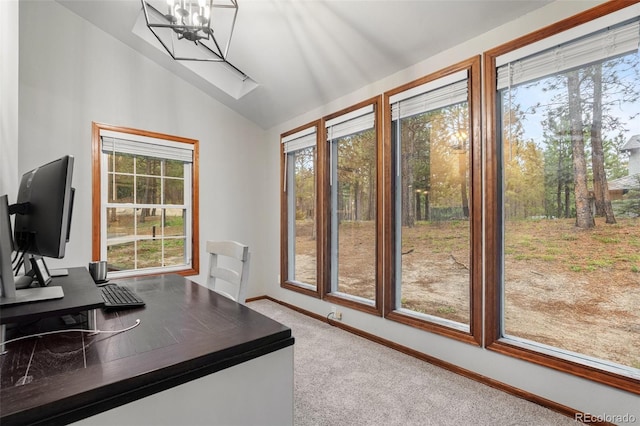 17540 Caribou Dr, Monument, CO 80132 - carpeted office with plenty of natural light, lofted ceiling, a chandelier, and baseboards