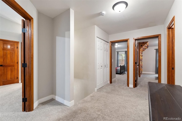 17540 Caribou Dr, Monument, CO 80132 - hallway featuring carpet flooring and baseboards